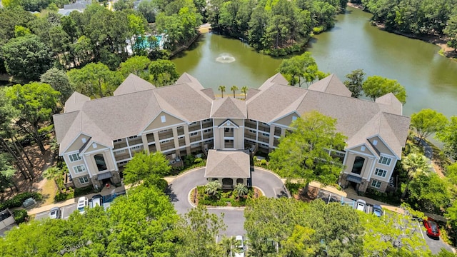 drone / aerial view with a water view