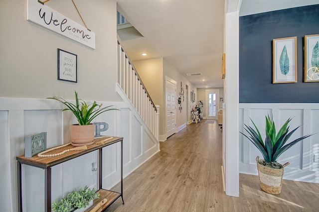 entrance foyer with light hardwood / wood-style flooring