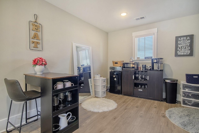 home office featuring light wood-type flooring