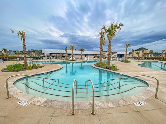 view of pool with a patio area