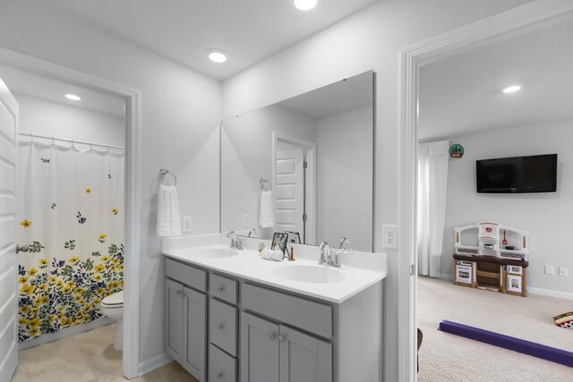 211 Squire Pope Rd, Summerville, SC 29486 - bathroom with toilet, double vanity, recessed lighting, baseboards, and a shower with curtain