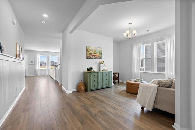 211 Squire Pope Rd, Summerville, SC 29486 - hall with a chandelier, baseboards, and wood-type flooring