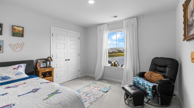 211 Squire Pope Rd, Summerville, SC 29486 - bedroom with light carpet, a closet, baseboards, and a water view