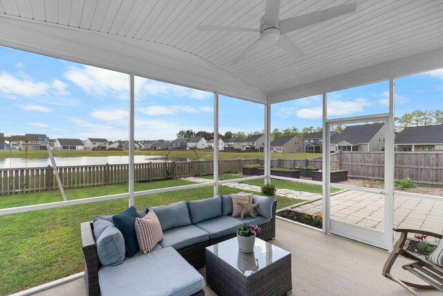 211 Squire Pope Rd, Summerville, SC 29486 - sunroom with a residential view, ceiling fan, a water view, an outdoor living space, and lofted ceiling