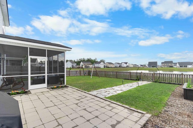 211 Squire Pope Rd, Summerville, SC 29486 - view of patio with a residential view, a sunroom, a playground, and a water view