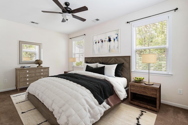 carpeted bedroom featuring ceiling fan