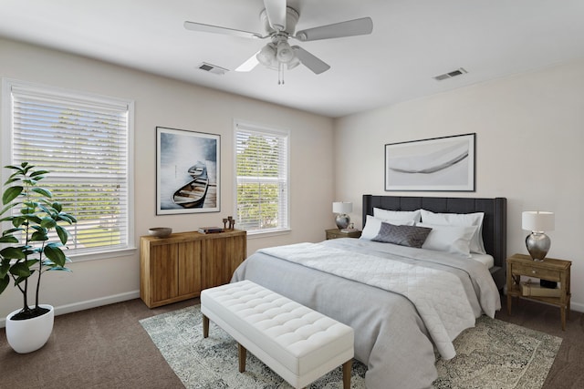 bedroom with ceiling fan and carpet