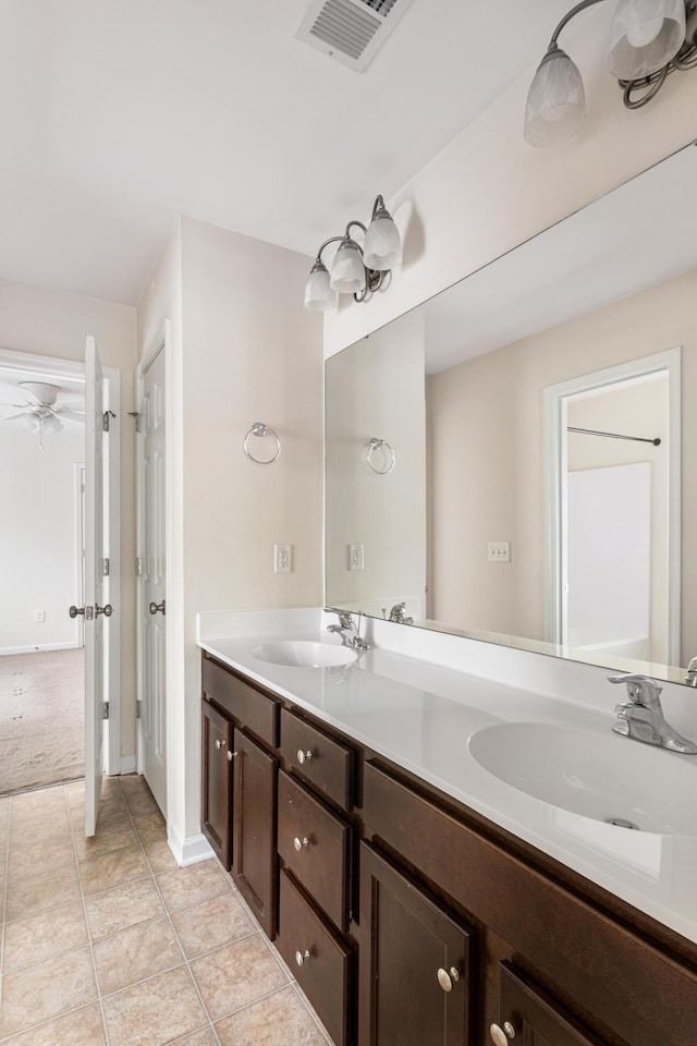 bathroom with vanity and tile patterned floors