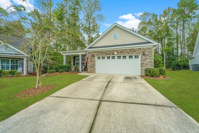 view of front facade with a garage and a front lawn