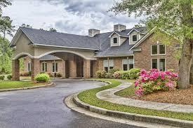 220 Brutus Ln, Summerville, SC 29485 - view of front of property featuring curved driveway and a chimney