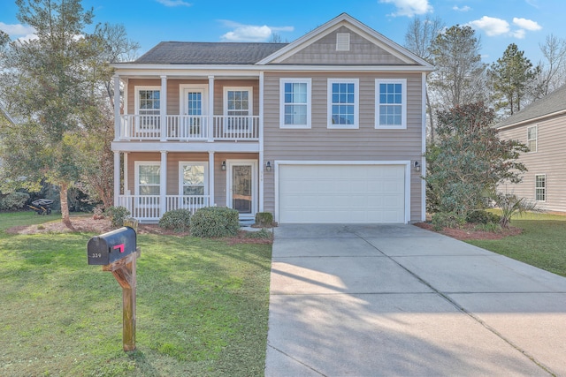 view of front of property featuring a porch, an attached garage, a balcony, driveway, and a front lawn