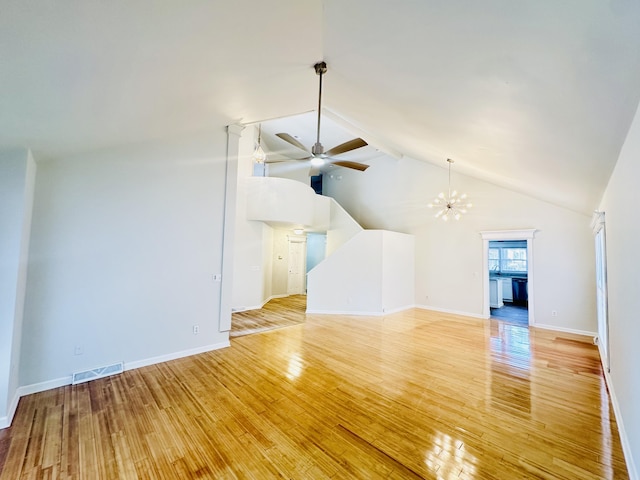 unfurnished living room with light wood-type flooring, visible vents, and baseboards