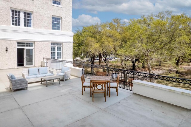 1 King Street 209 & 210, Charleston, SC 29401 - view of patio with an outdoor living space