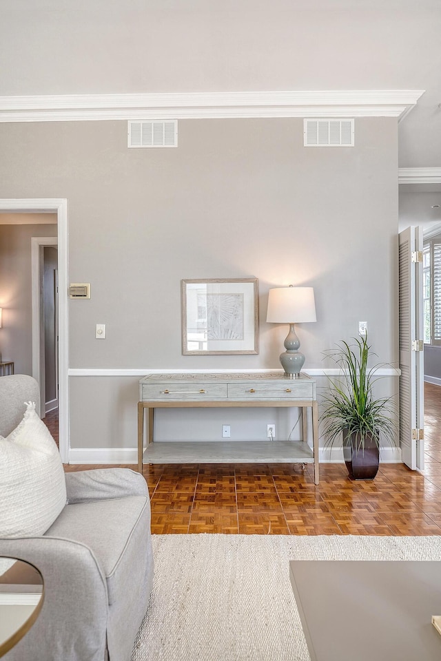 1 King Street 209 & 210, Charleston, SC 29401 - living area featuring baseboards and crown molding