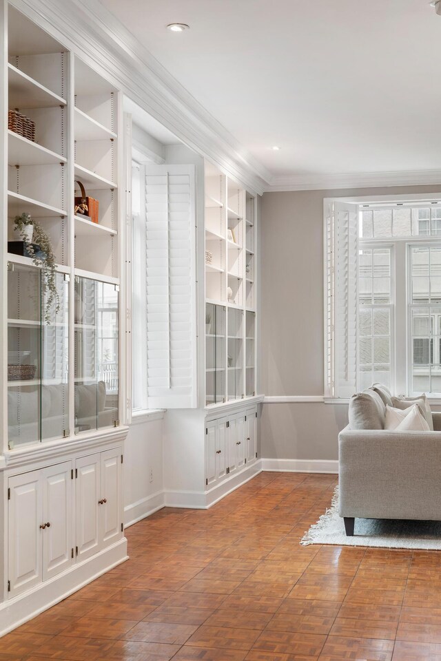 1 King Street 209 & 210, Charleston, SC 29401 - living area featuring crown molding, hardwood / wood-style floors, built in features, and recessed lighting