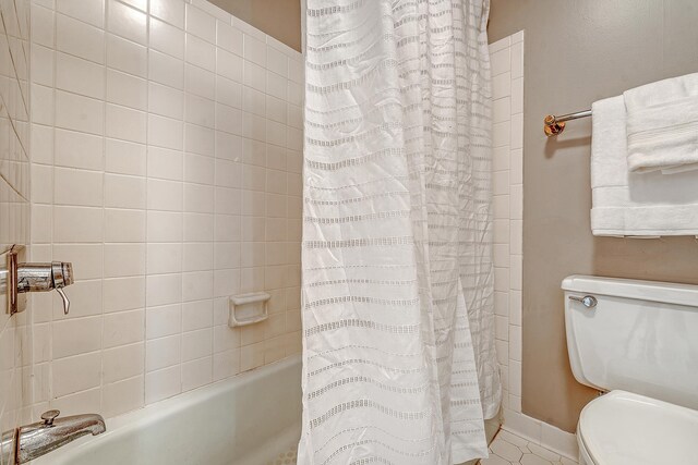 1 King Street 209 & 210, Charleston, SC 29401 - full bathroom featuring toilet and shower / tub combo with curtain
