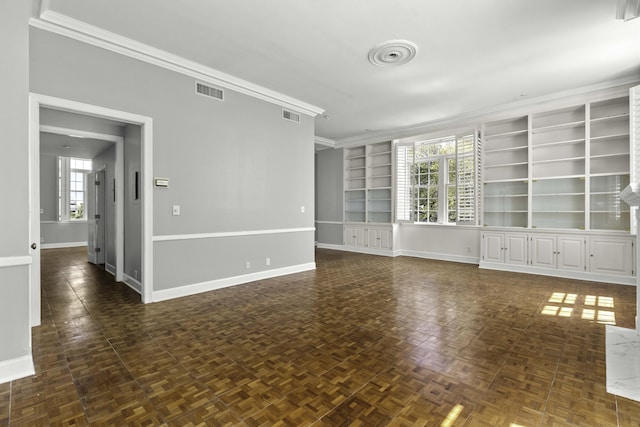 1 King Street 209 & 210, Charleston, SC 29401 - empty room with built in shelves, crown molding, and healthy amount of natural light