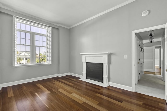 1 King Street 209 & 210, Charleston, SC 29401 - unfurnished living room featuring ornamental molding, healthy amount of natural light, dark wood-style floors, and a fireplace