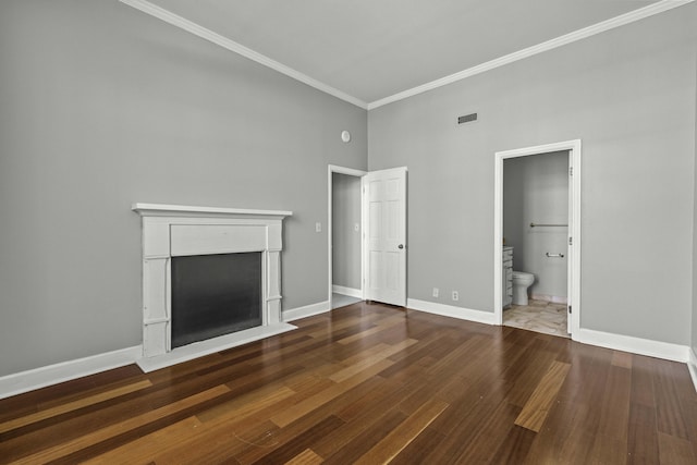 1 King Street 209 & 210, Charleston, SC 29401 - unfurnished living room featuring a towering ceiling, crown molding, wood finished floors, and a fireplace with flush hearth