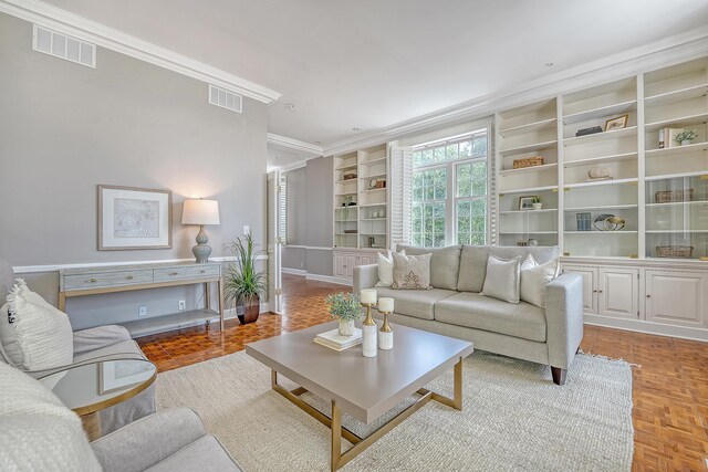 1 King Street 209 & 210, Charleston, SC 29401 - living room with crown molding and built in features