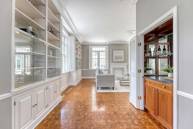 1 King Street 209 & 210, Charleston, SC 29401 - hall featuring crown molding and baseboards