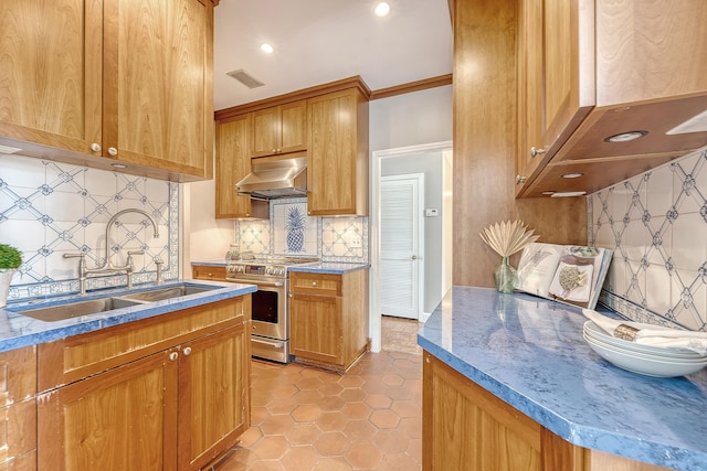 1 King Street 209 & 210, Charleston, SC 29401 - kitchen featuring stainless steel electric stove, range hood, tasteful backsplash, light stone countertops, and recessed lighting