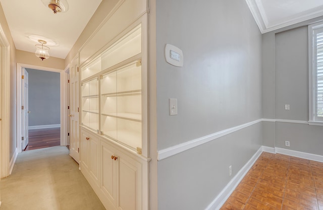 1 King Street 209 & 210, Charleston, SC 29401 - corridor with baseboards and crown molding