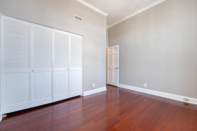 1 King Street 209 & 210, Charleston, SC 29401 - unfurnished bedroom with ornamental molding, wood finished floors, a closet, and a high ceiling