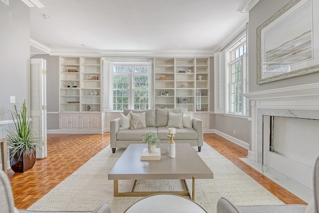 1 King Street 209 & 210, Charleston, SC 29401 - living room with crown molding, built in features, and a premium fireplace