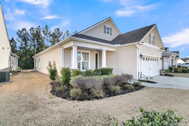 view of front of home featuring driveway and cooling unit