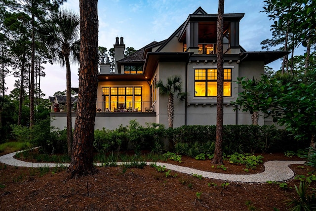 79 Trailing Vine Way, Kiawah Island, SC 29455 - view of front facade featuring stucco siding and a chimney