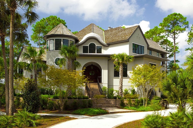 79 Trailing Vine Way, Kiawah Island, SC 29455 - view of front facade featuring stucco siding and stairs