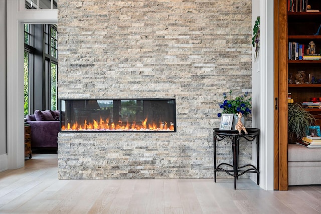 79 Trailing Vine Way, Kiawah Island, SC 29455 - detailed view of wood finished floors and a glass covered fireplace