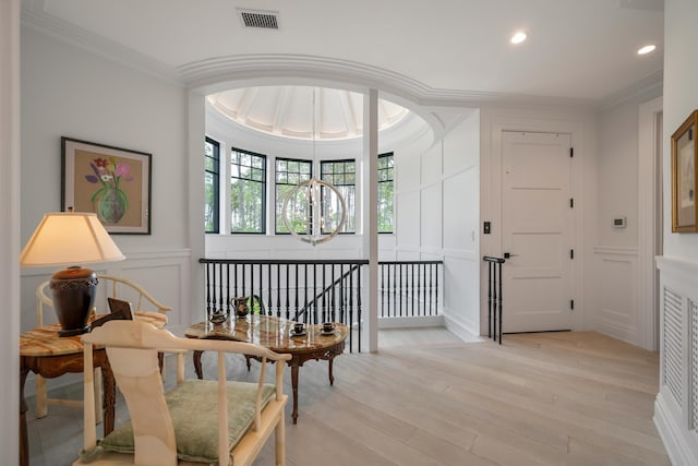 79 Trailing Vine Way, Kiawah Island, SC 29455 - living area with a decorative wall, crown molding, light wood-style flooring, and recessed lighting