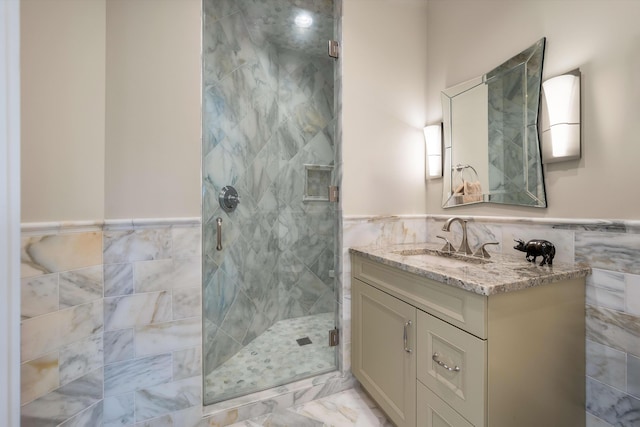 79 Trailing Vine Way, Kiawah Island, SC 29455 - full bathroom featuring tile walls, vanity, a stall shower, and wainscoting