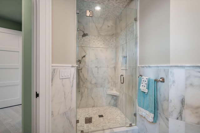79 Trailing Vine Way, Kiawah Island, SC 29455 - full bath featuring a marble finish shower and a wainscoted wall