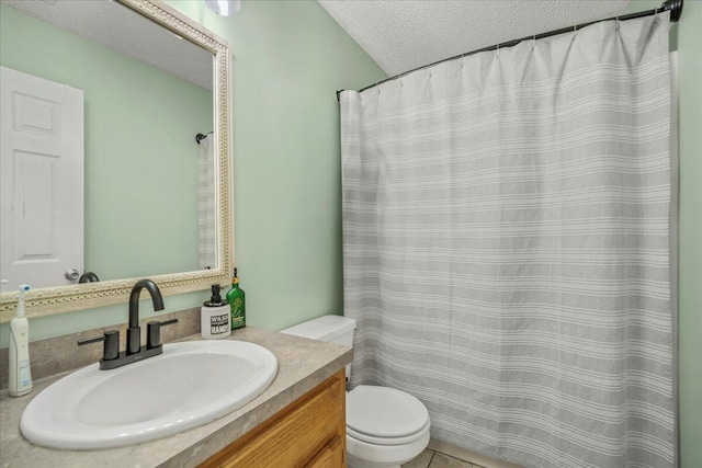 bathroom featuring toilet, a shower with curtain, a textured ceiling, and vanity