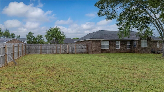 view of yard featuring a fenced backyard