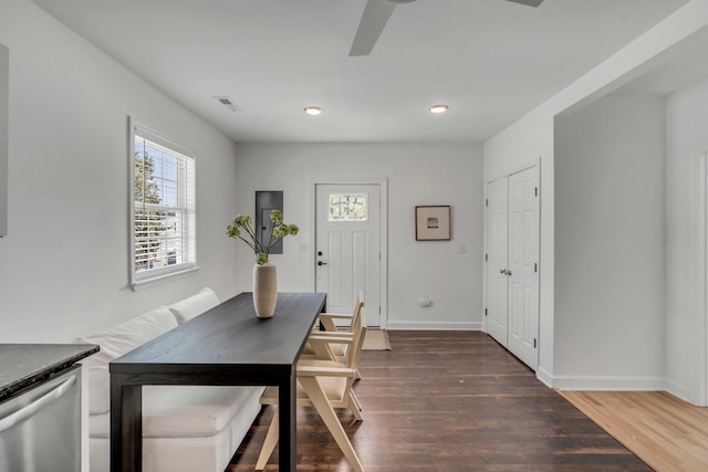 dining area featuring dark hardwood / wood-style flooring