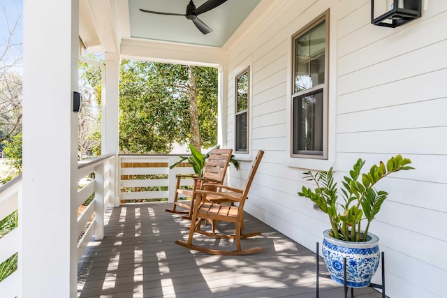 deck featuring ceiling fan and a porch