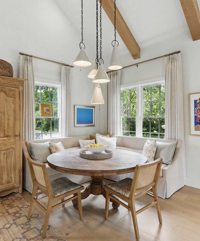926 Pitt St, Mount Pleasant, SC 29464 - dining area with breakfast area, beam ceiling, high vaulted ceiling, and light wood-style flooring
