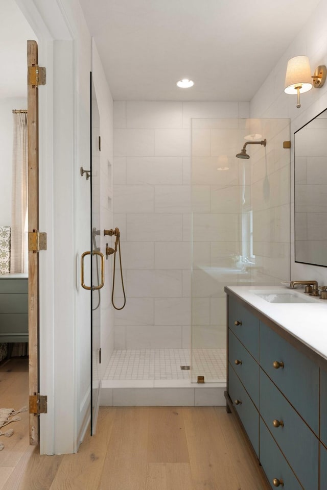 926 Pitt St, Mount Pleasant, SC 29464 - full bath with a stall shower, vanity, wood finished floors, and recessed lighting