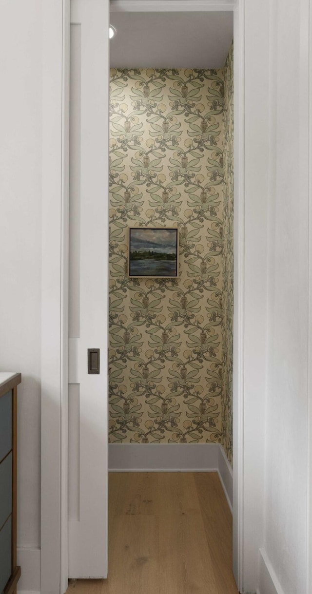 926 Pitt St, Mount Pleasant, SC 29464 - bathroom with wallpapered walls, wood finished floors, vanity, and baseboards