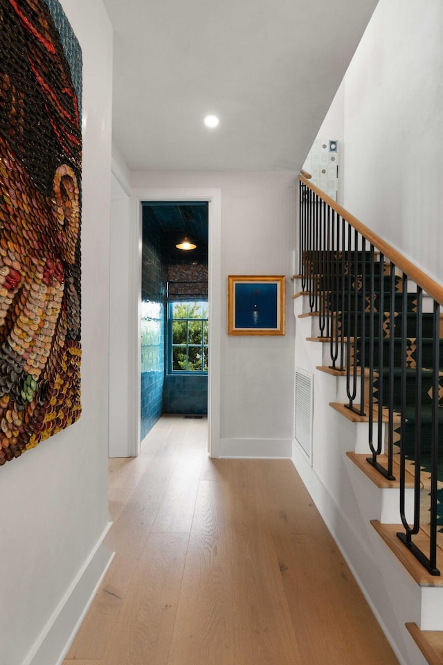 926 Pitt St, Mount Pleasant, SC 29464 - hall featuring wood finished floors, stairway, baseboards, and recessed lighting