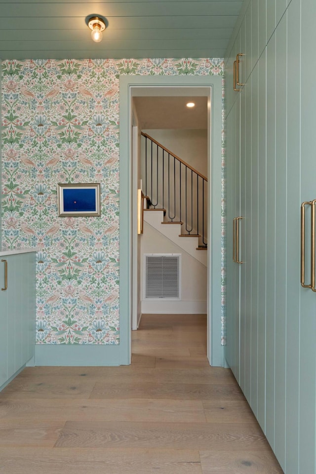 926 Pitt St, Mount Pleasant, SC 29464 - corridor featuring wallpapered walls, light wood finished floors, stairway, and baseboards