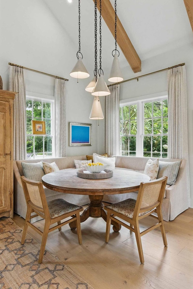 926 Pitt St, Mount Pleasant, SC 29464 - dining area with breakfast area, high vaulted ceiling, plenty of natural light, beamed ceiling, and light wood finished floors