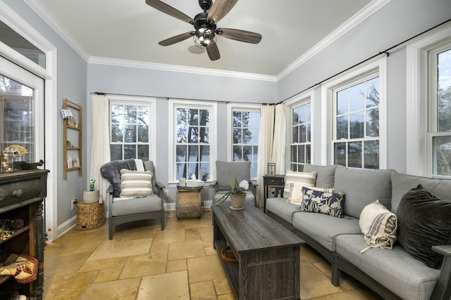 sunroom featuring a ceiling fan