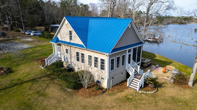 exterior space with a water view