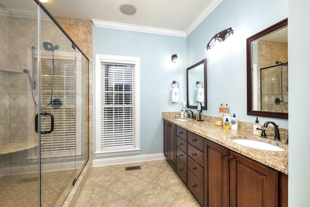 bathroom with visible vents, ornamental molding, a stall shower, and a sink