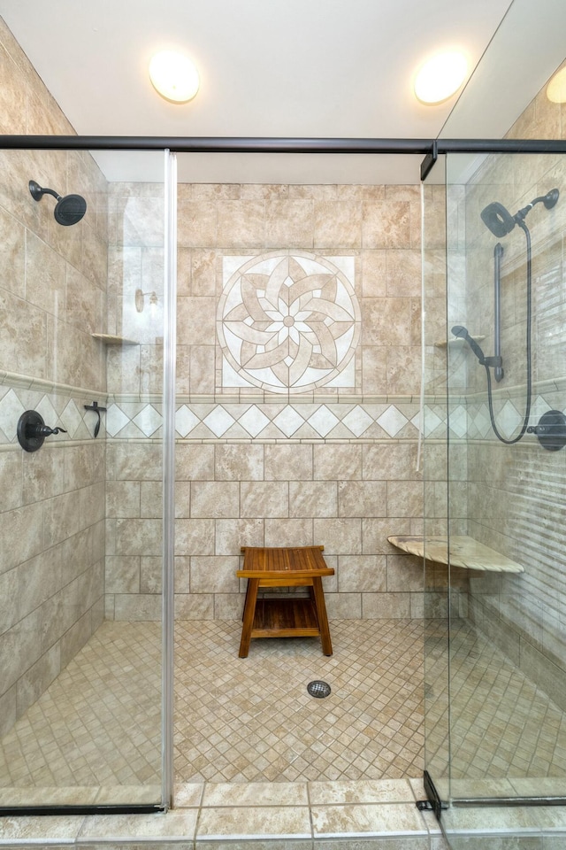 bathroom featuring a shower stall